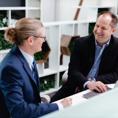 Happy client with consultant alternate